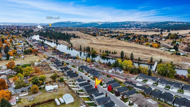 aerial view with a residential view and a water view