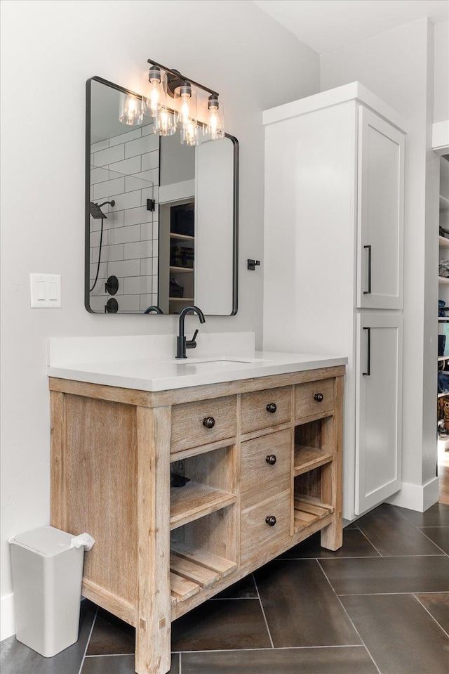 full bathroom with tile patterned floors and vanity