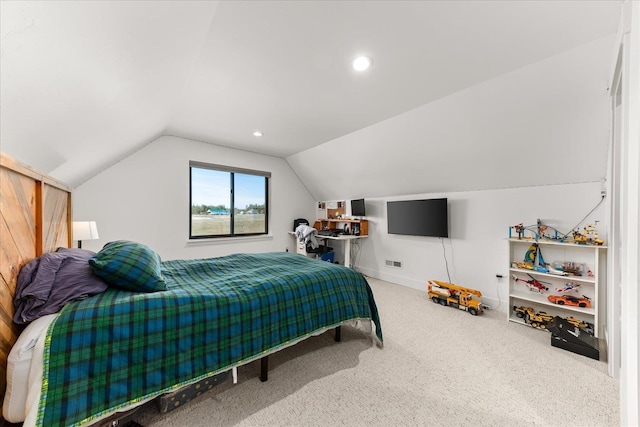 bedroom with lofted ceiling, recessed lighting, baseboards, and carpet floors