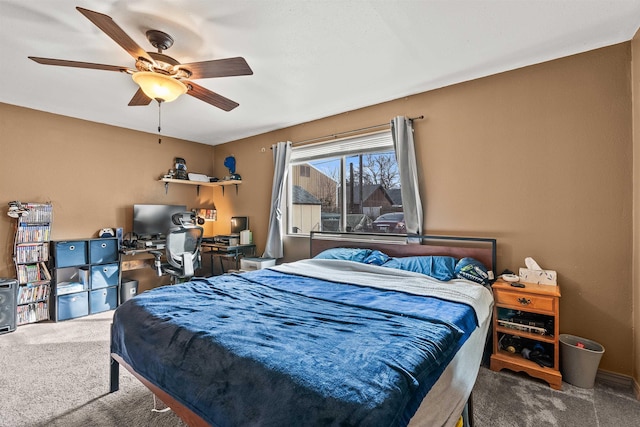 bedroom with carpet floors and a ceiling fan