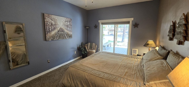 bedroom with baseboards and carpet flooring