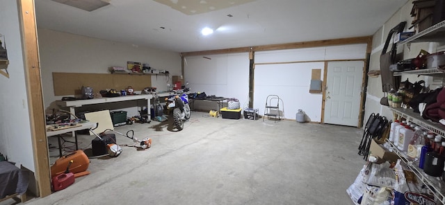 interior space featuring a garage and a workshop area