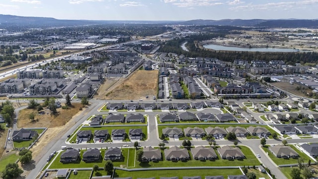 aerial view featuring a residential view and a water view