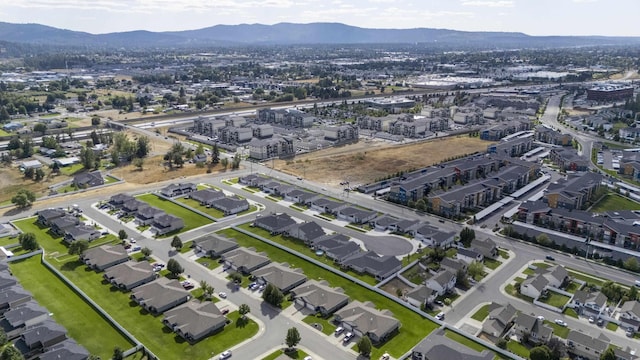 drone / aerial view featuring a mountain view