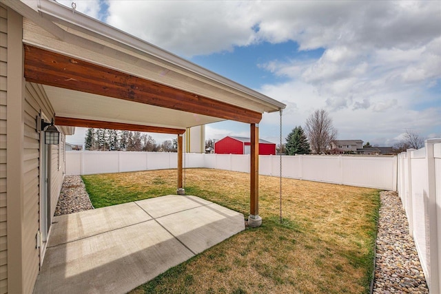 view of yard featuring a patio and a fenced backyard