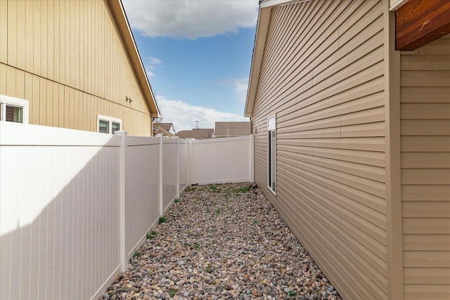 view of home's exterior with a fenced backyard