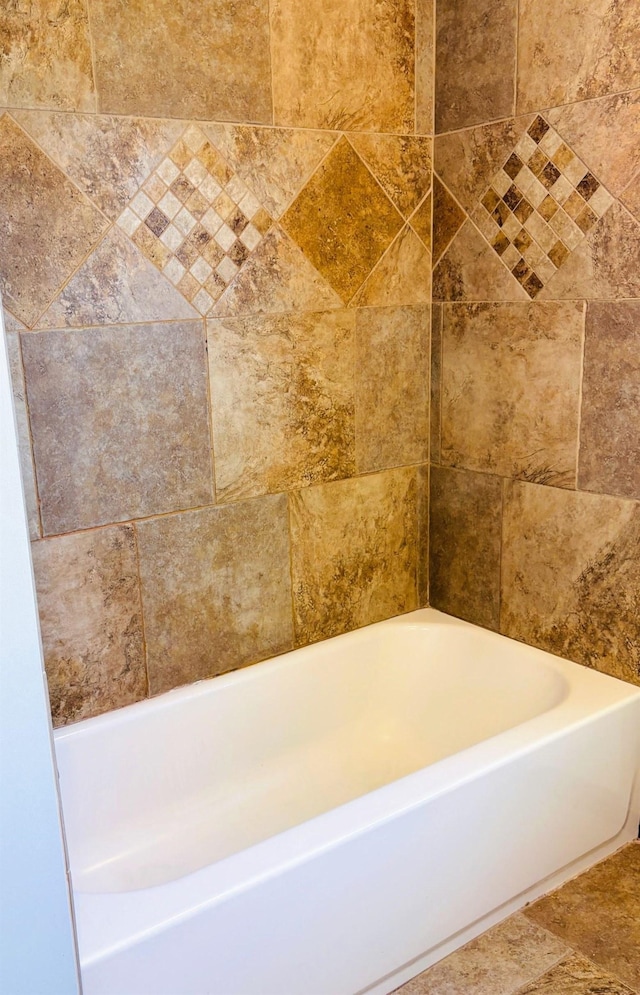 bathroom with a washtub