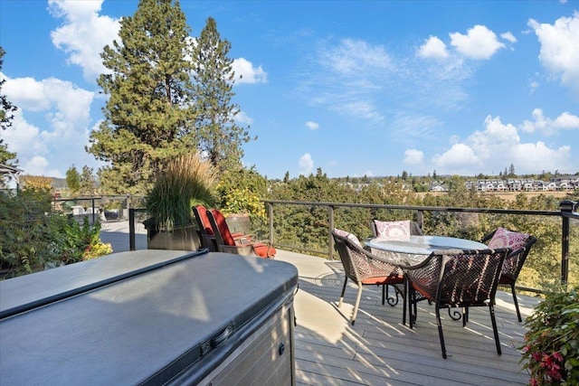 deck with outdoor dining area