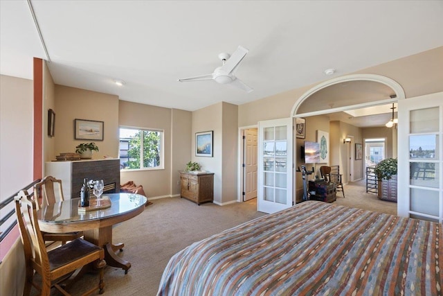 bedroom featuring carpet flooring, french doors, and baseboards