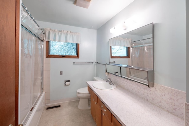 full bath featuring visible vents, shower / washtub combination, toilet, and vanity