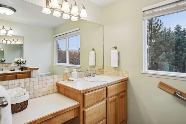 bathroom featuring backsplash and vanity