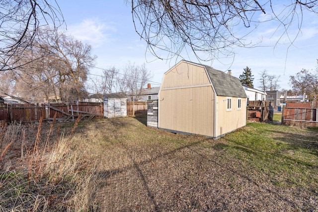 view of shed featuring a fenced backyard