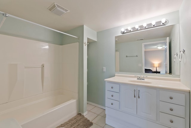 ensuite bathroom with vanity, visible vents, ensuite bath,  shower combination, and tile patterned floors