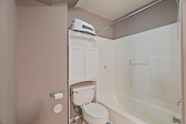 full bathroom featuring lofted ceiling, toilet, and tub / shower combination