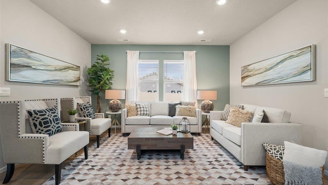 living area with visible vents and recessed lighting