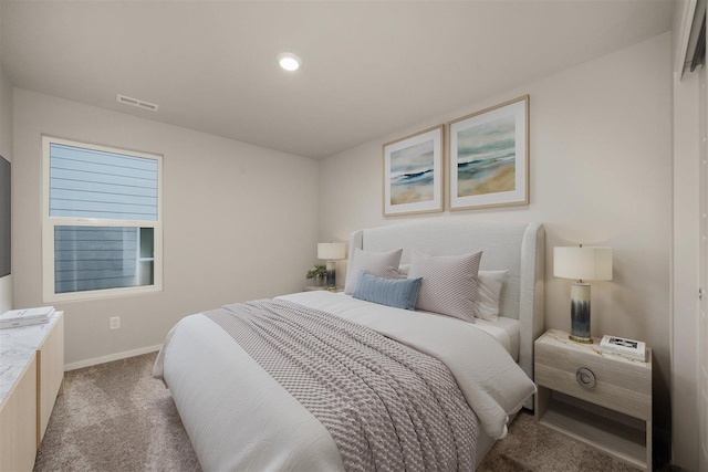 bedroom featuring light carpet, visible vents, recessed lighting, and baseboards