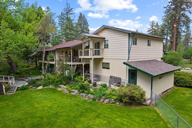 28003 N Hardesty Rd, Chattaroy, WA 99003 - back of property featuring a deck and roof with shingles