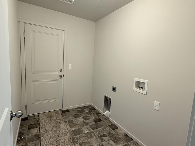 laundry room with washer hookup, stone finish flooring, baseboards, hookup for an electric dryer, and laundry area