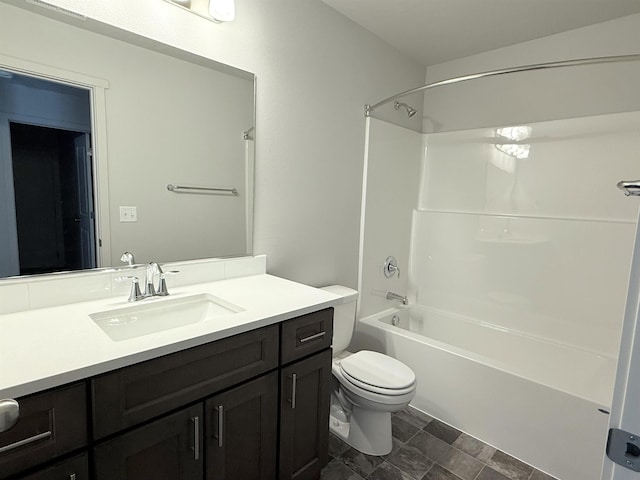 bathroom featuring vanity, toilet, and tub / shower combination