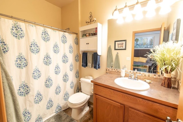 full bath with tile patterned floors, curtained shower, toilet, and vanity