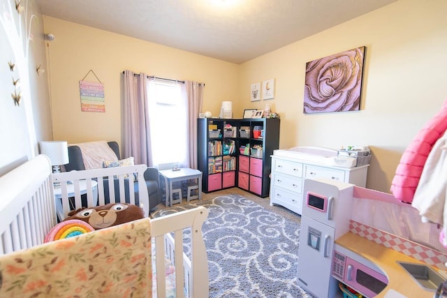 bedroom featuring light colored carpet