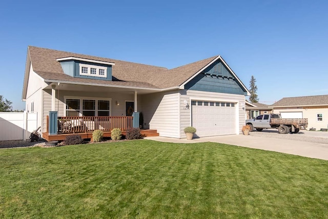 view of front of house featuring an attached garage, a porch, concrete driveway, and a front lawn