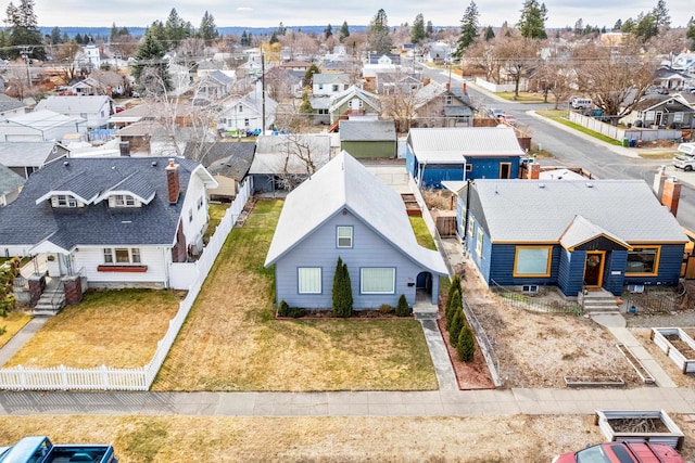 birds eye view of property with a residential view