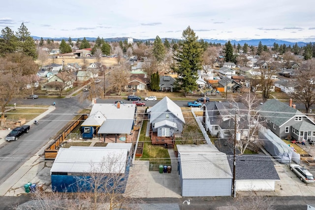 birds eye view of property featuring a mountain view and a residential view