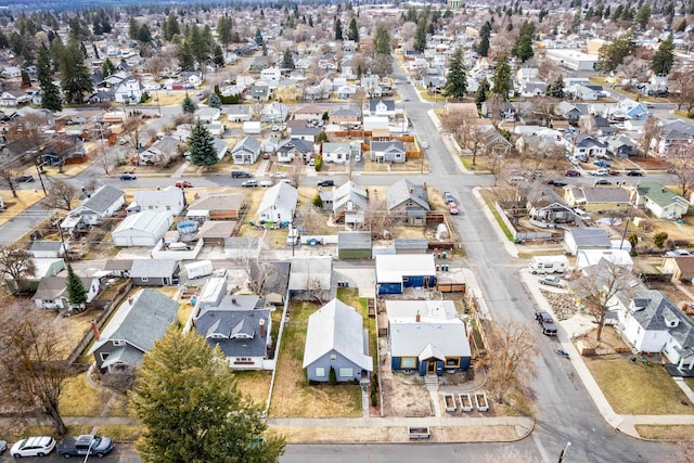 birds eye view of property with a residential view