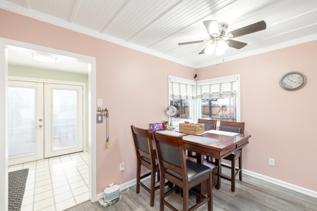 dining area with wood finished floors, french doors, baseboards, and ceiling fan