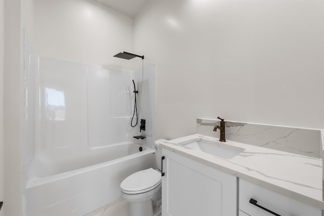 bathroom with toilet, vanity, and washtub / shower combination