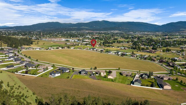 bird's eye view with a residential view and a mountain view