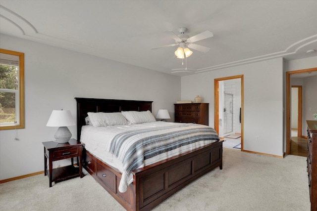 bedroom featuring a ceiling fan, baseboards, and light carpet