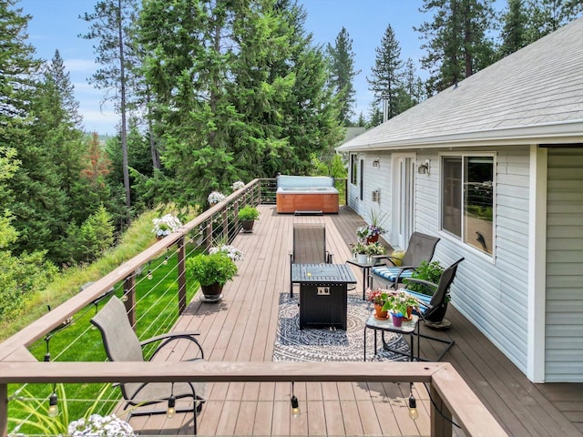 deck with a hot tub