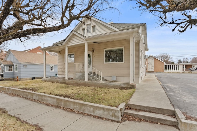 bungalow-style home featuring covered porch