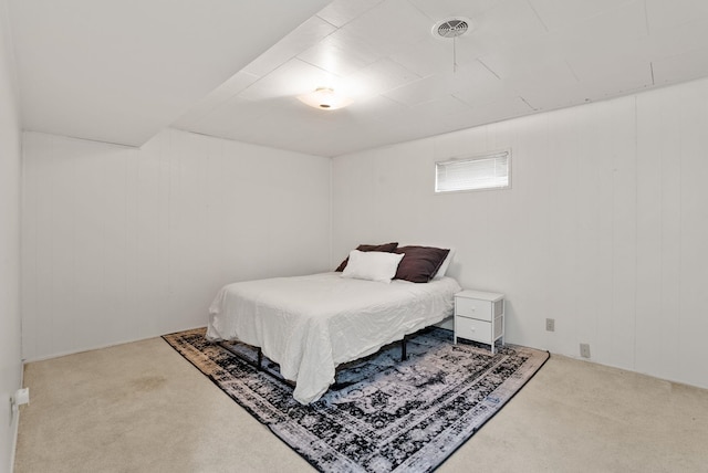 carpeted bedroom with visible vents