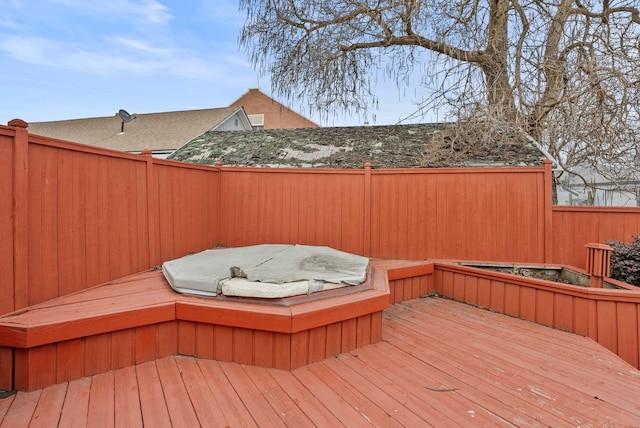 wooden terrace featuring fence