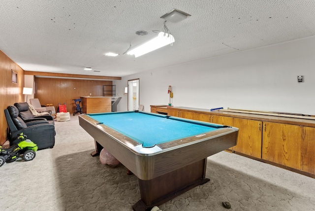 rec room featuring a textured ceiling, billiards, and carpet floors