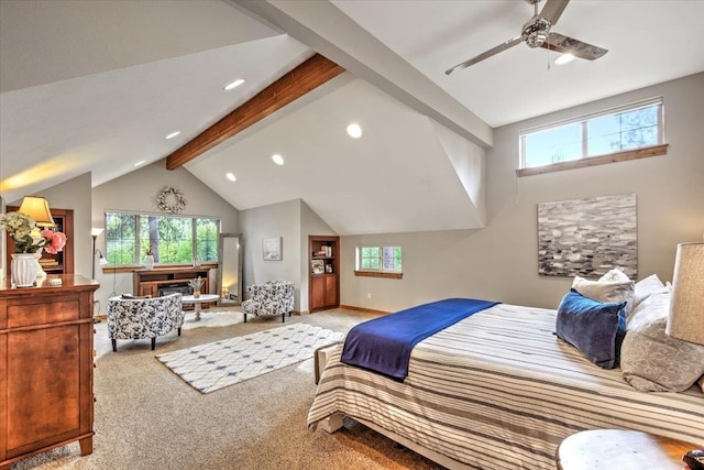 bedroom featuring baseboards, multiple windows, vaulted ceiling with beams, and carpet flooring