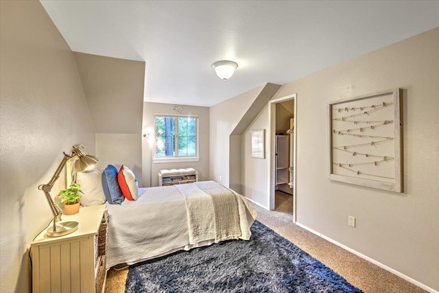 bedroom with baseboards and carpet floors