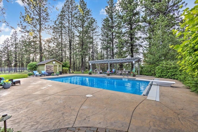 pool featuring a storage structure, fence, an outdoor structure, a patio area, and a pergola