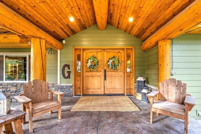 property entrance with stone siding