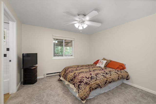 carpeted bedroom featuring a ceiling fan, baseboards, and a baseboard radiator