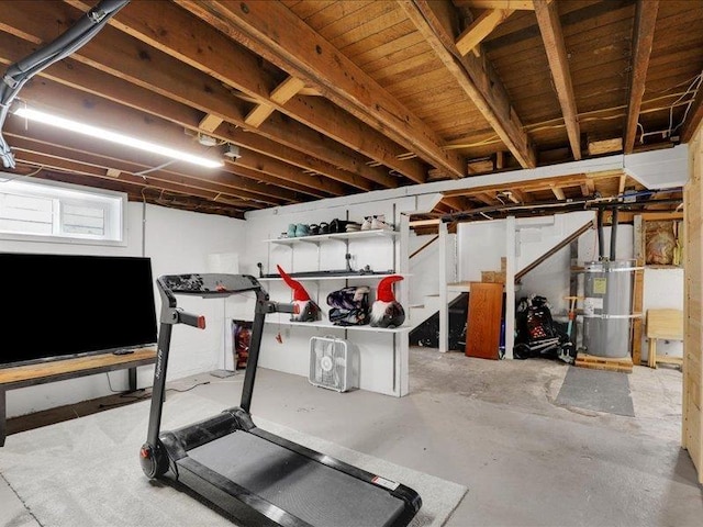 exercise area with secured water heater