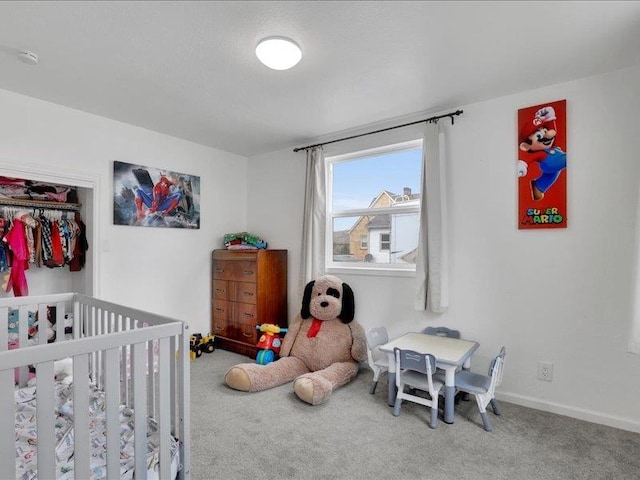 bedroom featuring baseboards and carpet flooring