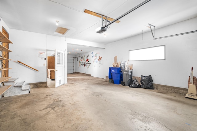 garage featuring a garage door opener