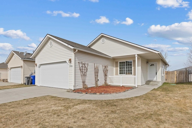 single story home with a front yard, concrete driveway, an attached garage, and fence