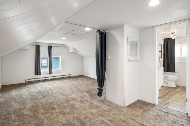 bonus room with recessed lighting, lofted ceiling, carpet, and a baseboard radiator