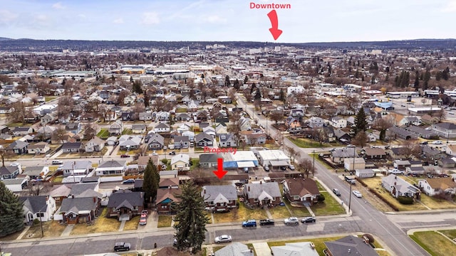 birds eye view of property with a residential view