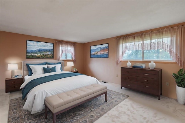 bedroom featuring light colored carpet